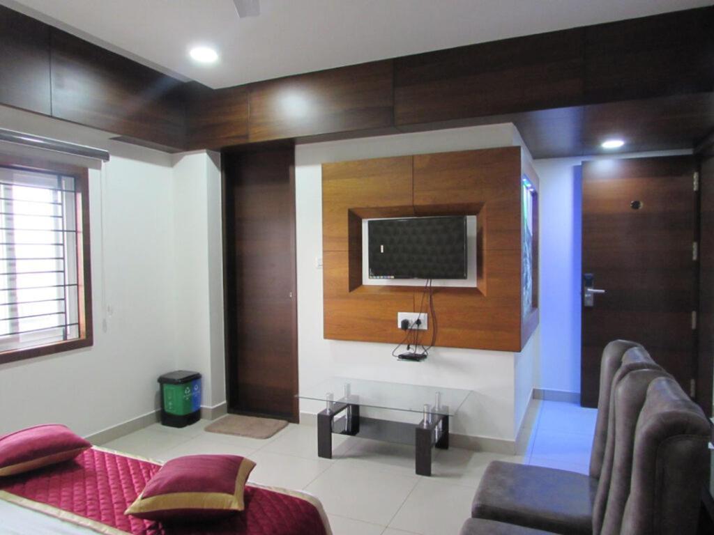 Udupi Regency Hotel Хасан Екстериор снимка