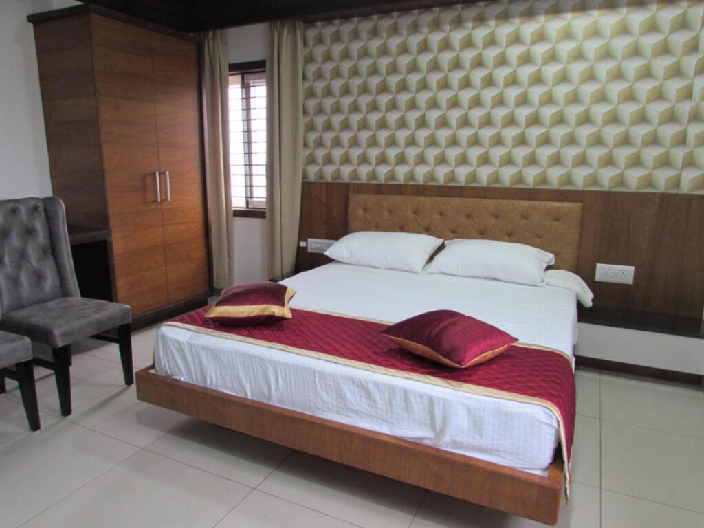Udupi Regency Hotel Хасан Екстериор снимка